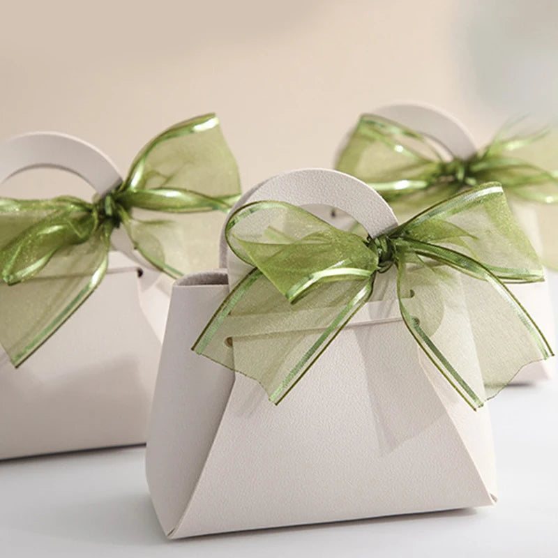 1PC Leather Gift Bags Bow Ribbon Packaging Bag Wedding Favour Distributions Bags Eid Mubarak Candy Packaging Box Mini Handbag