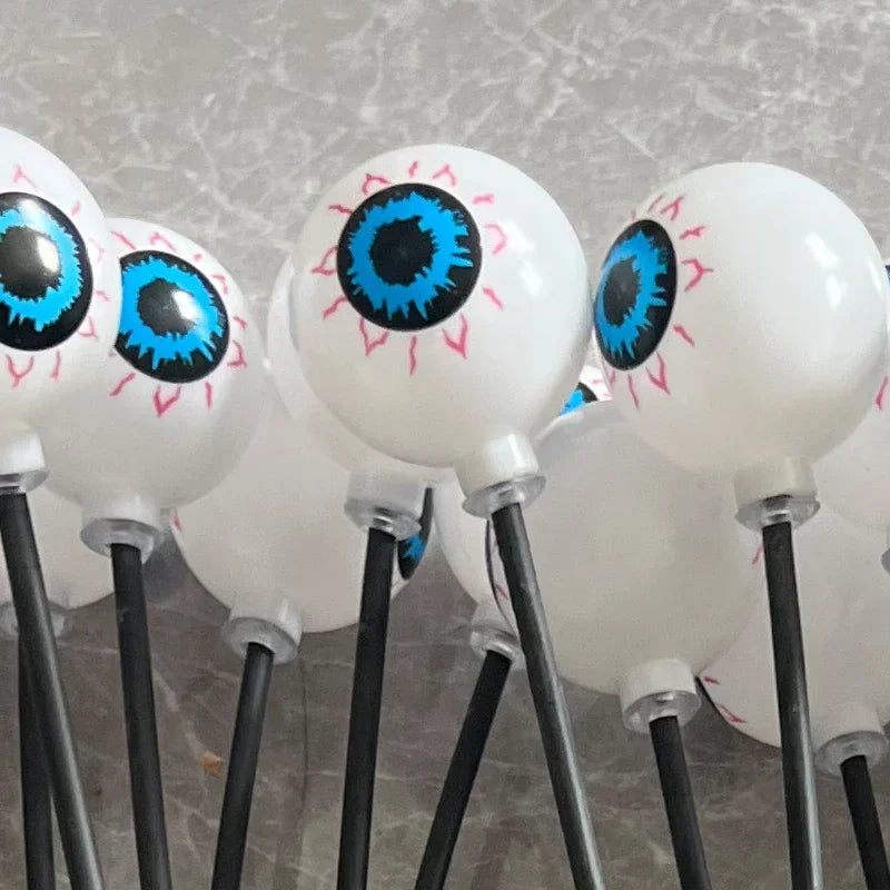 2024 Halloween Outdoor Solar Powered Scary Eyeball Lights Led Green Eyeball Blinking Firefly Lights Waterproof Solar Path Lights