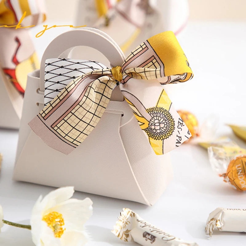 1PC Leather Gift Bags Bow Ribbon Packaging Bag Wedding Favour Distributions Bags Eid Mubarak Candy Packaging Box Mini Handbag